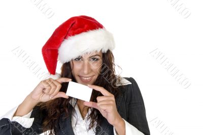 female holiding card