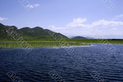 Idyllic panoramic picture of european lake near the mountains