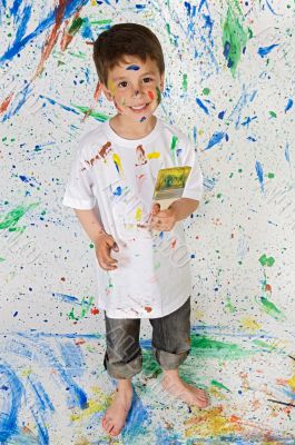 Little boy playing with painting Little boy playing with painting