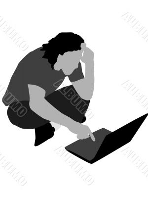 confused man looking at laptop