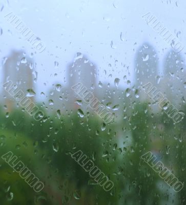 rain drops on a window rain drops on a window
