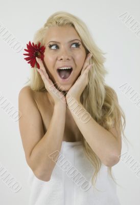 shocked female and gerbera in hair