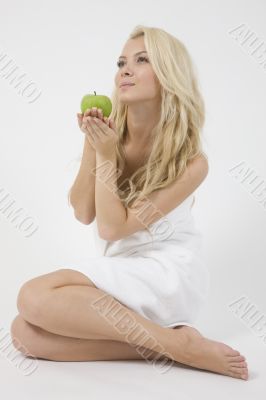 young female with green apple