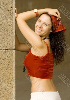 pretty brunette near column