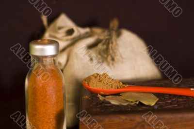 red and black pepper on the black