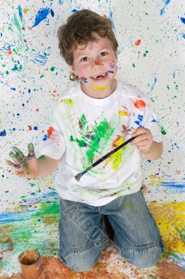 Funny little boy painted his hand Funny little boy painted his hand