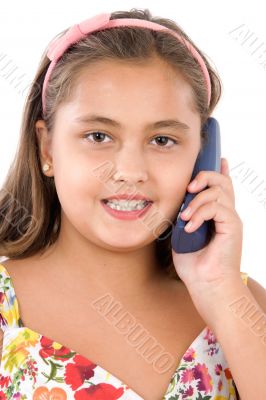 Adorable girl speaking by phone Adorable girl speaking by phone