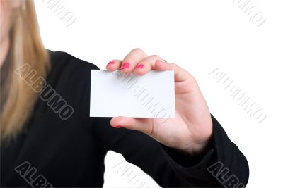 The girl holds a card in hands The girl holds a card in hands