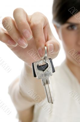 woman showing keys