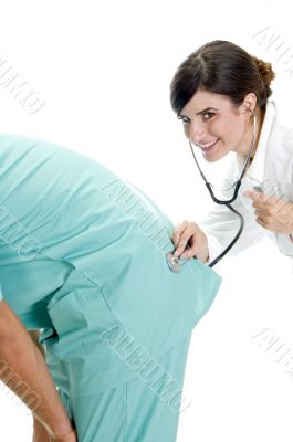 nurse examining the patient