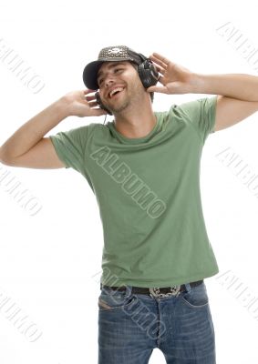 smiling man enjoying music