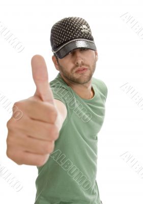 caucasian man showing thumb