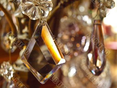 Crystal suspension bracket on an ancient chandelier in the Frenc