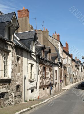 Old medieval street in the French small town

