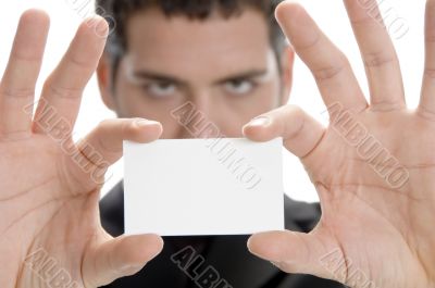 businessman holding his visiting card
