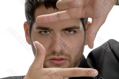 man showing framing hand gesture
