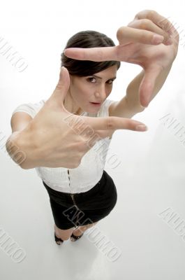 lady showing framing hand gesture