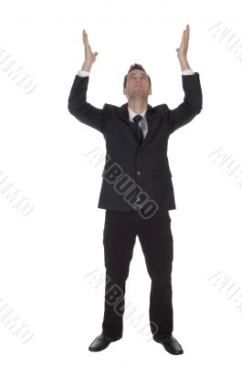 man making wish with raised hands