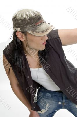 white model with cap and pendent