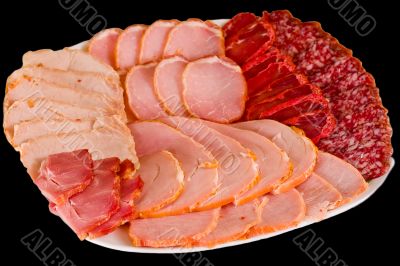 Plate with sausage and ham