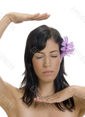 female with flower showing hand gesture