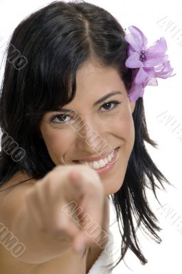 pointing woman looking to camera