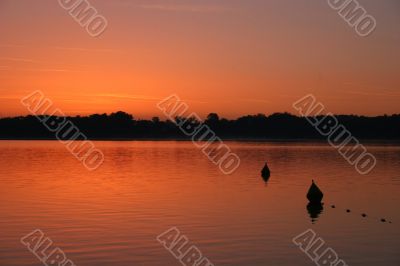 Red sunrise at lake Chiemsee, Germany