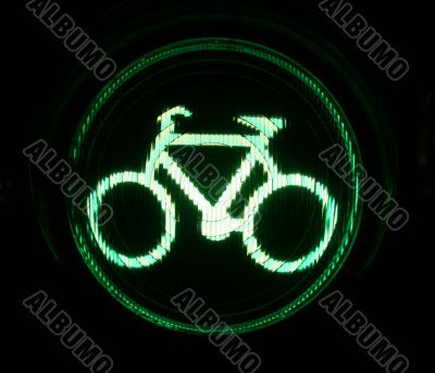 Green traffic light for bikers at night