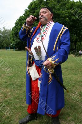 Old ukrainian Cossack with whiskers and pipe Old ukrainian Cossack with whiskers and pipe