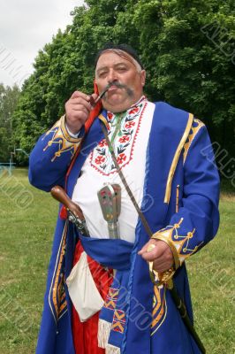 Old ukrainian Cossack with  whiskers and pipe
