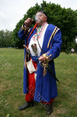 Old ukrainian Cossack with  whiskers and pipe