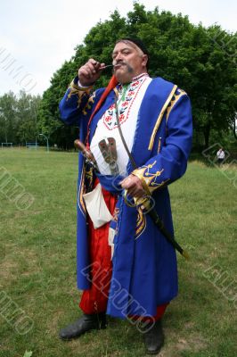 Old ukrainian Cossack with  whiskers and pipe