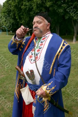 Old ukrainian Cossack with  whiskers and pipe