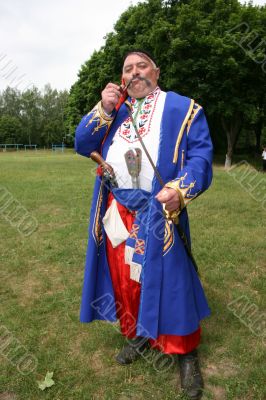 Old ukrainian Cossack with  whiskers and pipe