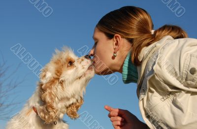 kissing woman and dog