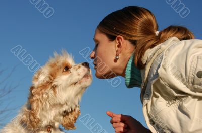 kissing woman and dog