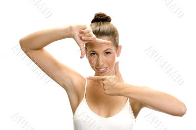 white woman showing framing hand gesture