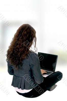 female busy with laptop