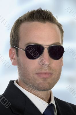 young american businessman with sunglasses