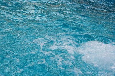 textured rippled deep blue water surface