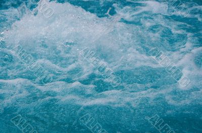 textured rippled deep blue water surface