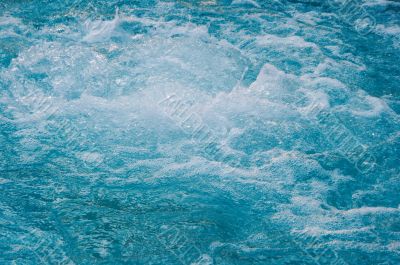 textured rippled deep blue water surface