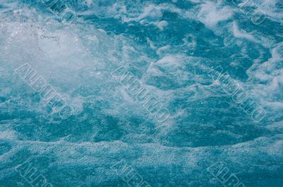 textured rippled deep blue water surface