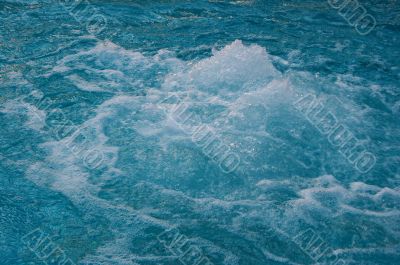 textured rippled deep blue water surface