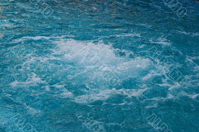 textured rippled deep blue water surface