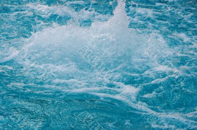 textured rippled deep blue water surface