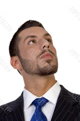 posing man looking upward