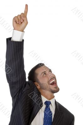 happy businessman pointing upward