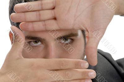 businessman making frame with fingers