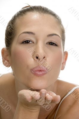 blonde lady giving flying kiss